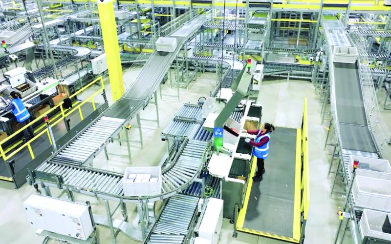 A screenshot from a Walmart promotional video shows the inside of the company’s next-generation fulfillment centers that combine the work of employees, robotics and automated shipping technology to move packages to customers. Walmart announced last week that a new next-generation fulfillment center will be built in Franklin County and employ 1,000 workers. Photo courtesy of Walmart.com.