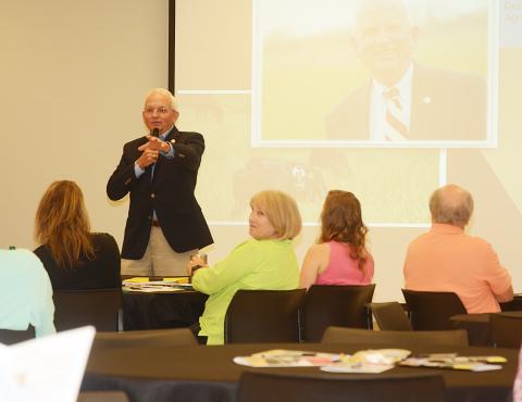 Sunshot by Michael Hall — State Commissioner of Agriculture Gary Black speaks to a crowd of regional officials Tuesday at the Hart County AgriScience Center in Hartwell.