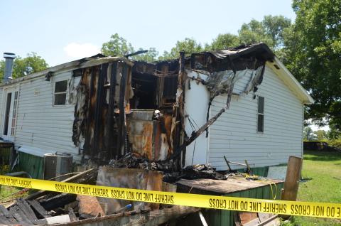 Authoritie have taken out arrest warrants for a Vanna man they claim intentionally set fire to this home on Joe Findley Road.