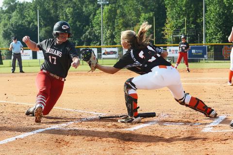 Sunshots by Michael Hall Hart County catcher Annslee Mitchell tags out Stephens County baserunner Kasey Westmoreland on Saturday at Hart County High School during the Lady Diamond Dogs’ 13-1 loss in the first game of the season. 
