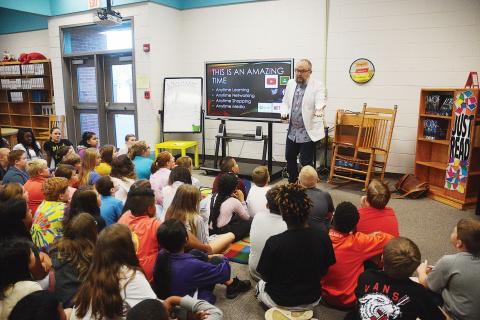 Sunshot by Michael Hall -- A group of fifth-grade students at South Hart Elementary listen on Aug. 29 to Brian Buffington, director of instructional technology for Pioneer RESA, teach about how to stay safe and be positive on social media and online.