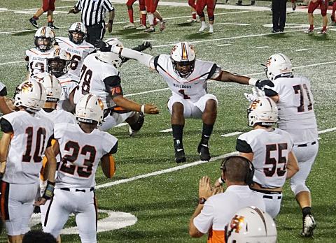 Photos submitted — Hart County’s Kaimon Rucker, No. 1, leaps as he celebrates a play on Sept. 14 in Madison County with Will Hardmon, No. 78, Caden Hart, No. 71, Seth Elrod, No. 55 and Malachi Kelley, No. 23.  