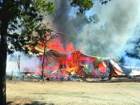 Photo submitted The Lake House Tavern burns Saturday morning on Rock Springs Road.