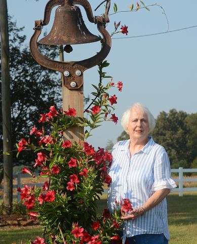 Sunshots by Michael Hall Mary Jo Shiflet poses for a photo, above, near an old farm bell in her yard just outside of Hartwell. Shiflet, 78, has a positive outlook on life despite tragedies from the past. 