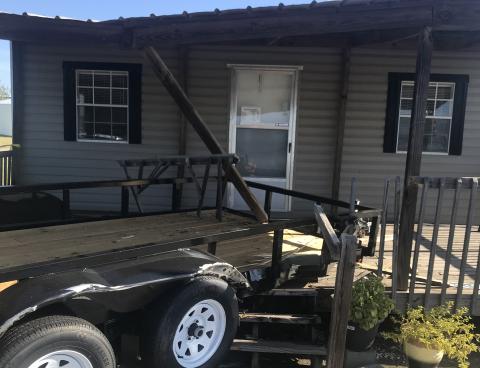 Photo submitted — A trailer is shown crashed into a porch on the front of the office at Rockland Mini Buildings in Hartwell after an SUV drove through the lot on E. Franklin Street sometime early Sunday morning, Sept. 22, damaging property. 