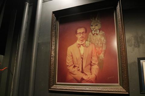 Sunshot by Grayson Williams — This picture of the Rev. Harry Hannah and Harvey the rabbit inexplicably falls off the wall in Hart County Community Theater on Depot Street due to what people think is a haunting. 