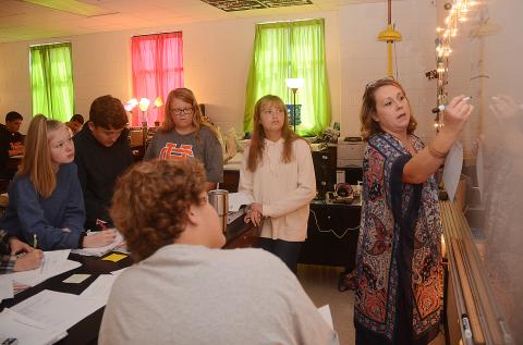 Sunshot by Michael Hall — Hart County High School science teacher shows how to convert measurements to her students on Oct. 8.