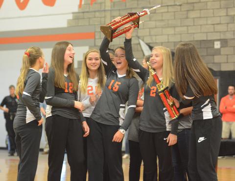 Sunshot by Michael Hall — Brooklyn Hubbard, Ryann Williamson, Abby Hubbard, Ella Franklin, Hannah Harris and Lillie Kate Rogers show off their North Georgia State Championship trophy at a pep rally on Oct. 7 at Hart County Middle School. 