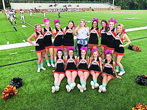 Photo submitted — The Hart County junior varsity cheerleading squad poses for a photo showing off their blue socks with Courtney Turner, center, to raise awareness for Dysautonomia.