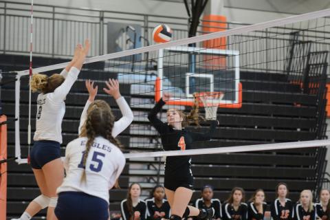 Sunshot by Grayson Williams — Ashley Chapman goes for the kill for the Volleydogs in the Area 8-AAA tournament at Hart County High School. The team finished in fourth place, qualifying it for the state tournament. 