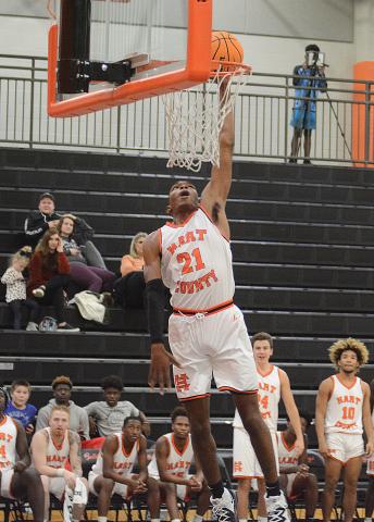 Shone Webb dunks during a scrimmage on Tuesday at Hart County High School. 