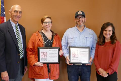 Tiffany Rucker and Patrick Guarnella, center, are pictured with Carrie Barnes of Georgia EMC and Rope Roberts Georgia Power Co.