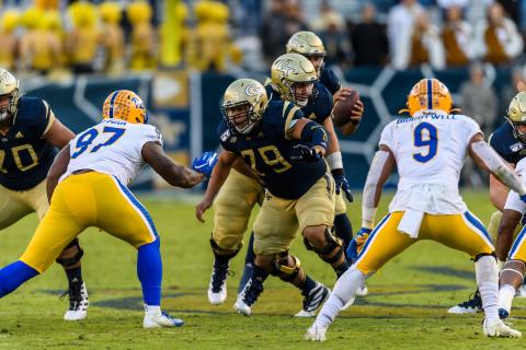 Photos by Danny Karnik/Georgia Tech - Georgia Tech center William Lay, center, a Hart County graduate, blocks on the offensive line during a game this season against Pittsburgh.