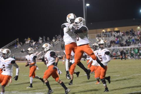 Bulldog players celebrate after a touchdown against Franklin County on Nov. 1. 
