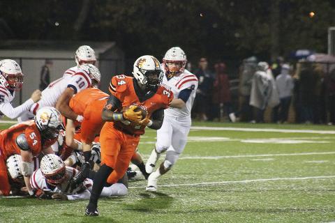 J.L. Lackey looks for running room against Haralson in the first round of the playoffs on Nov. 15 at Herndon Stadium.