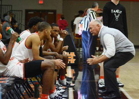 Sunshot by Michael Hall — Hart County head boys’ basketball coach Harry Marsh talks to his team prior to tip-off against Abbeville at home on Saturday in which the Bulldogs won 68-57, marking Marsh’s 650th win as a boys’ team head coach.