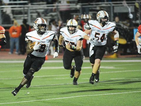 Sunshot by Grayson Williams - The Bulldogs’ defense pulls down Greater Atlanta Christian quarterback Jackson Hardy on Nov. 29 in Norcross in Hart County’s season-ending 17-16 loss to the Spartans.