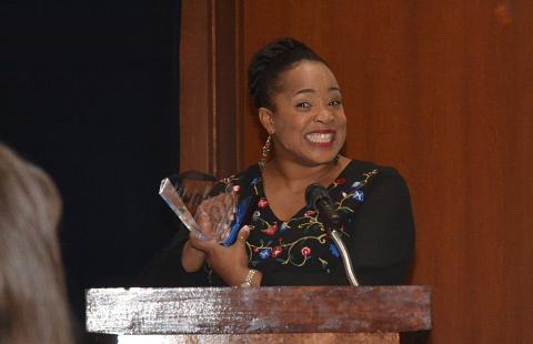 Sunshots by Michael Hall Kristie Rucker smiles as she speaks to the crowd at the annual Hart County Chamber of Commerce Awards Banquet after winning the Volunteer of the Year Award. 