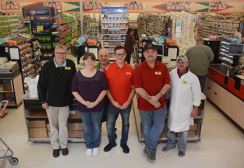 Sunshot by Michael Hall - From left to right are Quality Foods store manager Tony Lark, Joan Kimbrell, Curtis Seymour, Eric Bailey, Shannon Vickery and Tex Maxwell.