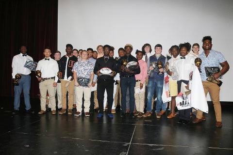 Sunshot by Grayson Williams - Hart County Football award winners show off their awards after the Hart County Football banquet on Jan. 16.Sunshot by Grayson Williams Hart County Football award winners show off their awards after the Hart County Football banquet on Jan. 16.