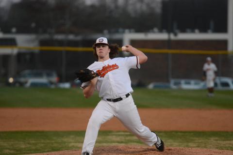 Sunshot by Grayson Williams - Hart County pitcher Peyton Powell deals on Friday, Feb. 14, at Saye Field at Hart County High School in the Diamond Dogs’ opening night win. 