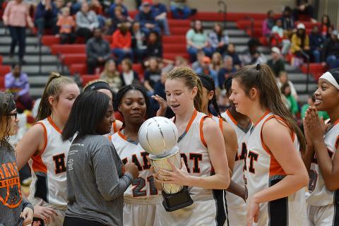 Sunshots by Michael Hall - The Hart County Middle School eighth-grade Lady Dogs celebrate their NEGIAA championship on Feb. 1 at Madison County Middle School. 