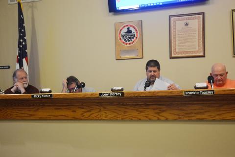 Hart County commissioners Marshall Sayer, from left, Ricky Carter, chairman Joey Dorsey and Frankie Teasley are shown at the special-called meeting Wednesday night.