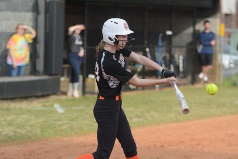 Sunshot by Grayson Williams - Emilee Sanders swings at a pitch in Hart County’s slow-pitch softball game last week against East Jackson. 