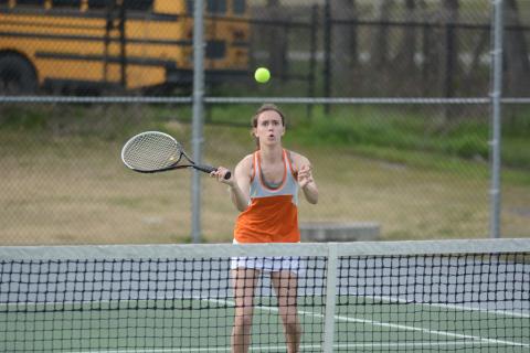 Sunshot by Grayson Williams - Sydney Smith returns a volley at Hart County High School on March 12. 