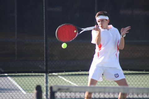 Sunshot by Grayson Williams - Hart County’s Zach Foley returns a ball in the No. 1 doubles match last Thursday against Madison County at Hart County High School.