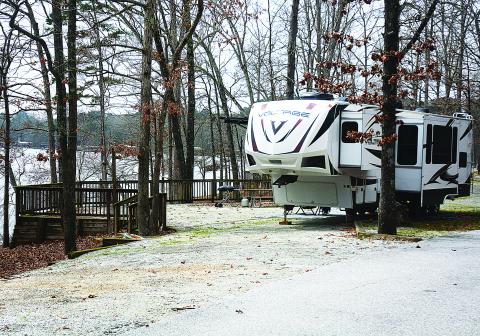 Sunshot from file — A fifth-wheel camper is parked at a campsite at Hartwell Lakeside earlier this spring. 
