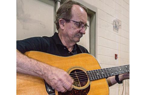 Sunshot by Bill Powell — Richard Frady plays the guitar in 2018, prior to his battle with COVID-19 that has had him hospitalized in Anderson since March 28. 