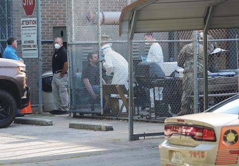Sunshot by Michael Hall — The National Guard tests detention officers and deputies at the Hart County Jail on Sunday May 17. 