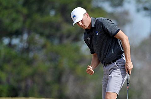 Hart County High School graduate Eli Scott celebrates sinking a putt during his freshman year at College of Coastal Georgia in Brunswick.  Derrick Davis/The Brunswick News