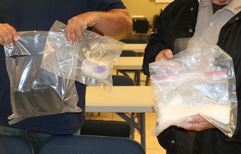 Sunshot by Grayson Williams — Methamphetamine, ecstasy and paraphernalia seized during a drug trafficking bust on Christmas Tree Farm Road in Hart County are shown. 