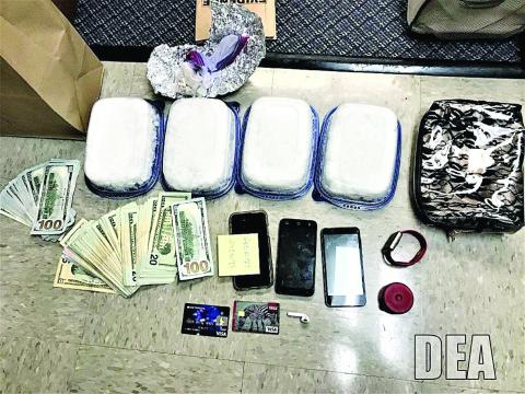 Photo submitted — Methamphetamine, cash, cellphones, and other items seized as part of a federal investigation are shown.