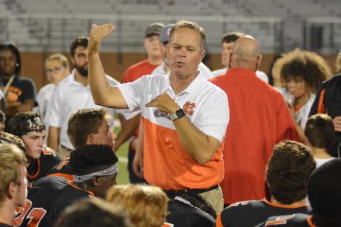 Hart County High School head football coach and athletic director, Rance Gillespie, talks to the Bulldog football team during a game against Jackson County in 2019.