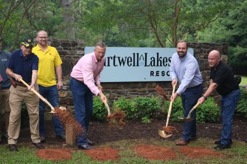 Sunshot by Grayson Williams — Hartwell Lakeside campground operator Barry Stern, from left to right, Chris Rademacher of Kampgrounds of America, U.S. Rep. Doug Collins, Hartwell mayor Brandon Johnson and Hartwell city councilman Tray Hicks ceremonially break ground on Hartwell Lakeside on Tuesday, June 23. 
