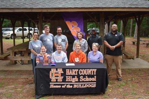 Photo submitted — Pictured are, back row, from left to right, assistant Hart County High School cross country coach Ana Gordy, head coach Cecil Marrett, Floyd Ramsey, HCMS Deborah Rogers, Tevin Glaze and Kendall Rucker. On the front row are, from left to right, Gabrielle Garringer, Sam’s sister, his father Jodon Garringer, Sam Garringer and mother Marcie Garringer.