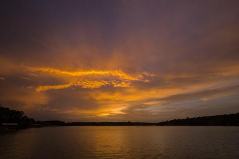 Sunshots by Bill Powell — The sun sets over Lake Hartwell and paints the sky hues of orange on Saturday, June 26, as a massive plume of dust from the Saharan Desert passes over the Southeastern U.S.