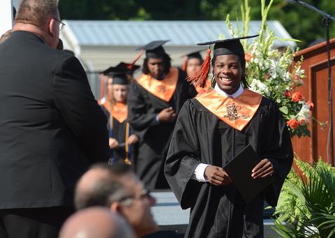 Sunshots by Michael Hall Jabriel Martin grins from ear to ear after receiving his diploma Saturday, July 18, at Hart County High School during the pandemic-postponed graduation ceremony. 