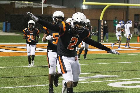 Sunshot from file — Hart County safety Montae Maxwell puts his arms like an air plane in celebration after making a play for the Bulldogs’ in 2019. Maxwell recently committed to play college ball at Georgia Southern University.