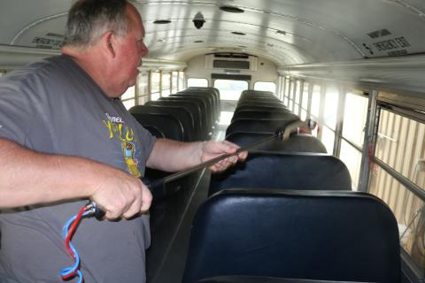 Sunshot by Grayson Williams — Jeff Garner, Hart County Charter System transportation director, shows how a disinfecting fogger works that will be used to sanitize buses during the school year. 