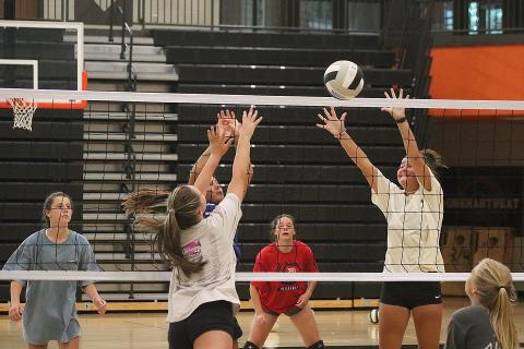 Sunshot by Grayson Williams — The Hart County volleyball team practices at the gym at Hart County High School on Monday, Aug. 3. The team is eyeing a deeper playoff run this season. 
