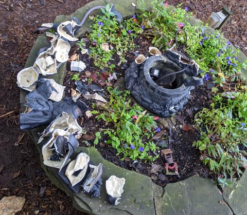 Photo submitted - A fountain in the Anne King Garden at the Hart County Botanical Garden is shown in pieces after recent vandalism.