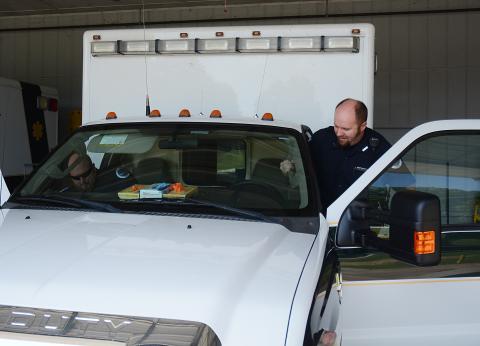 Sunshot by Michael Hall - Paramedic T.J. Brister climbs into the driver’s seat of an ambulance to head out to a call last week at the Hart County EMS headquarters. 