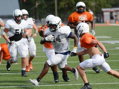 Sunshot by Michael Hall - Hart County running back J.L. Lackey finds a hole to score a touchdown on Friday, Aug. 28 during an intrasquad scrimmage at Herndon Stadium at Hart County High School. The Bulldogs are set to open their season on Friday, Sept. 4, at Wayne County at 7:30 p.m. following a COVID-19 cancellation of the Elbert County game. 