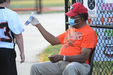 Sunshot by Grayson Williams Joel Gaines, right, spent more than 30 years as a Hartwell Police Officer. Today he is loving life while volunteering to take tickets at Hart County football games, among other things. 