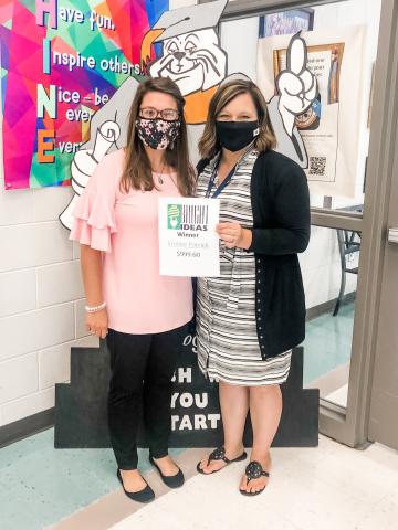 Photos submitted North Hart’s Emilee Patrick, above left, is pictured with principal Haley Smith. 