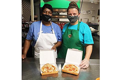 Photo submitted - Hart County Middle School cafeteria staff show off the new Smart Mouth Pizzas the school is serving this year.